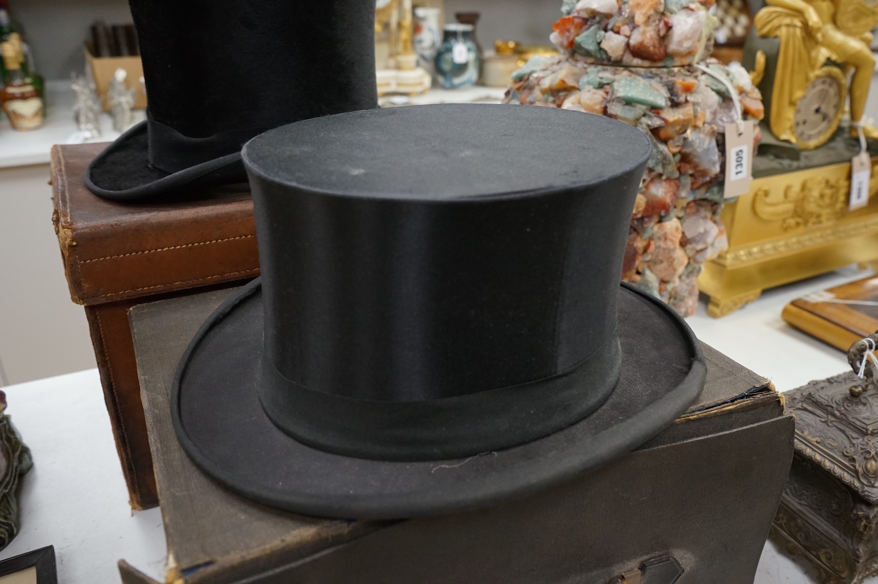 A Scott & Co. top hat with brush in leather case, together with a cased opera hat.